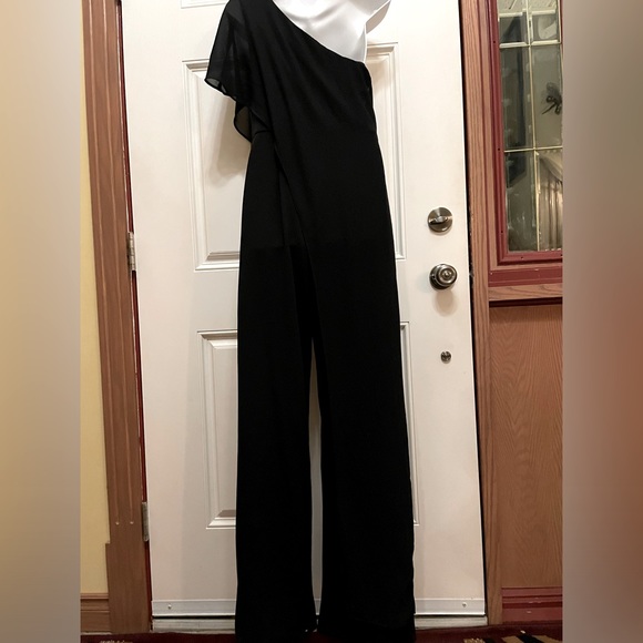 Le chateau one Shoulder black Jumpsuit with a black sheer overlay. Very Elegant - Picture 1 of 14